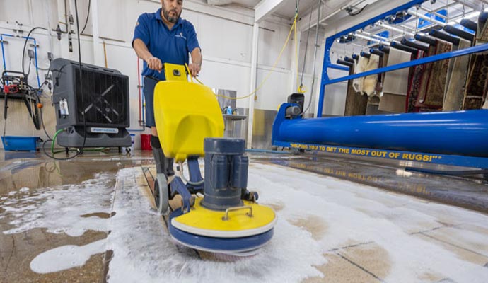 Rug cleaning using equipment