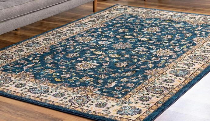 clean prayer rug placed on wooden floor