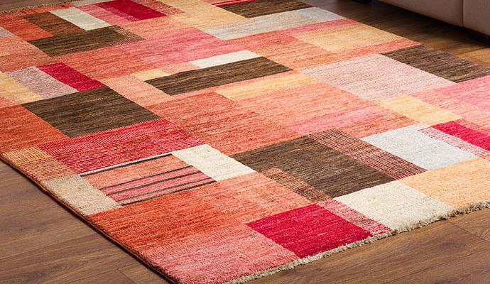 A colorful rug on the floor