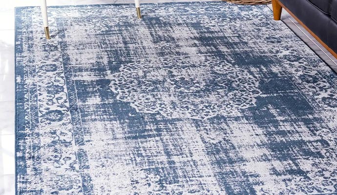 A systematic rug on white tiled floor